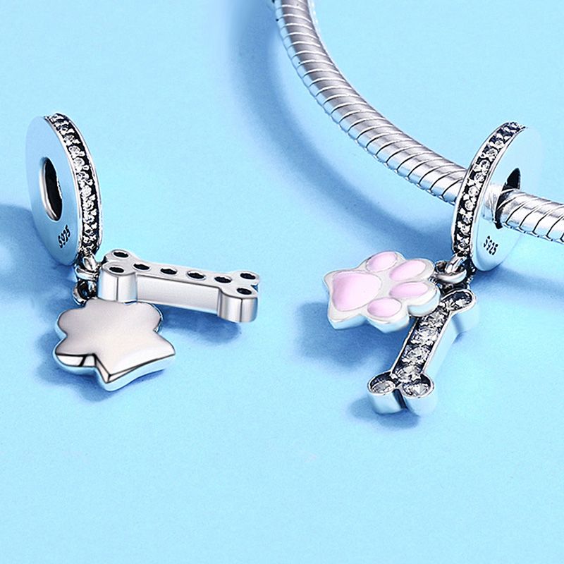 Charm Colgante Pata y Hueso