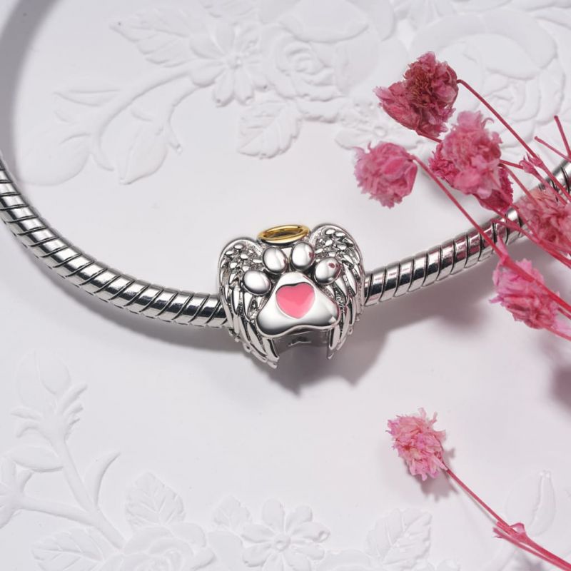 Charm Conmemorativo Mascota Alas de Amor