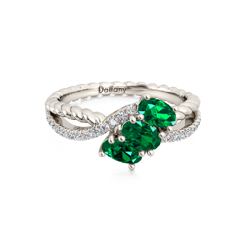Anillo Infinito Torcido Esmeralda Ovalada