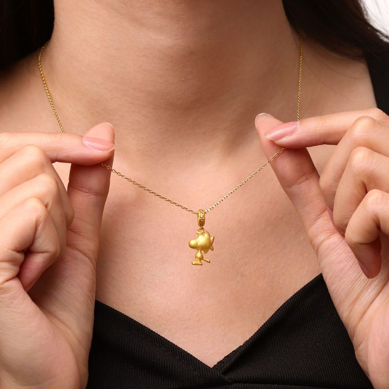 Colgante Woodstock de oro de 18 K