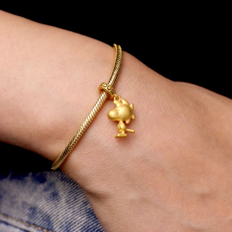 Colgante Woodstock de oro de 18 K