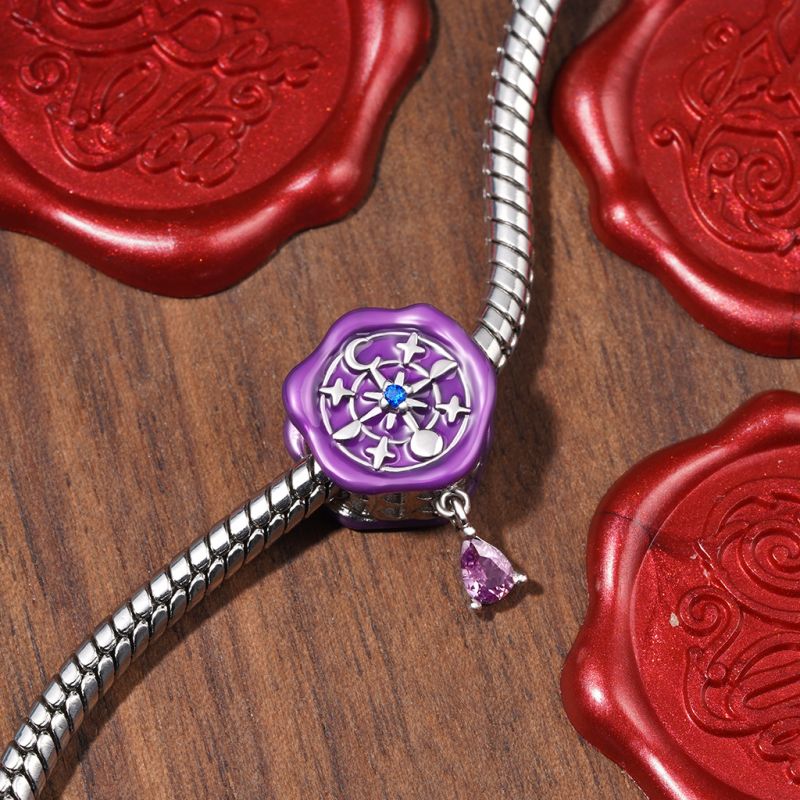 Charm de Brújula Cósmica