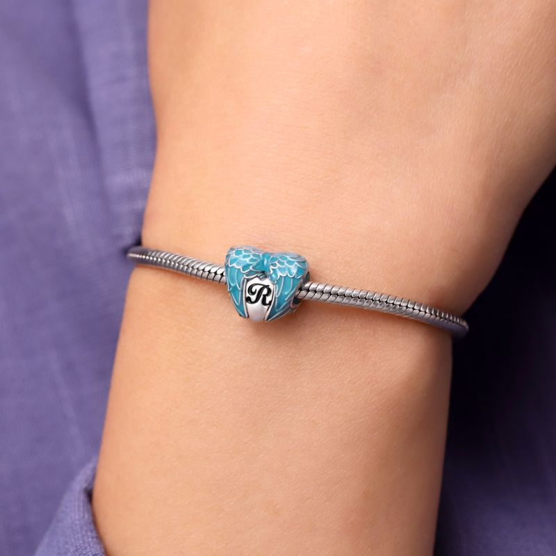 Charm de Corazón Con Alas Azules